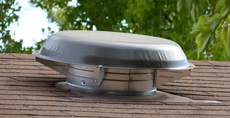 attic fan installation services with low-profile roof ventilation unit in Denver, CO