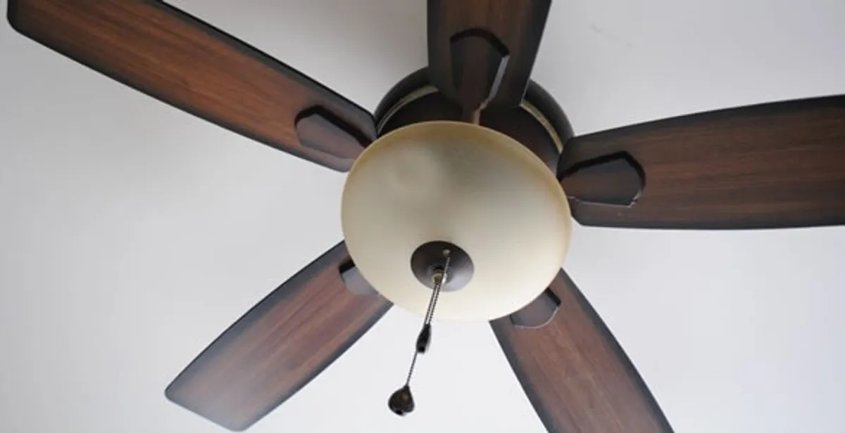 Fully installed ceiling fan with balanced blades and light fixture in Denver, CO