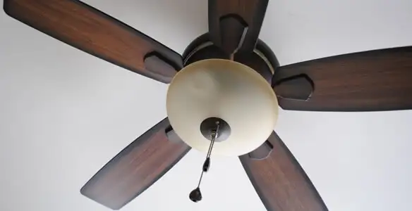 Fully installed ceiling fan with balanced blades and light fixture in Denver, CO