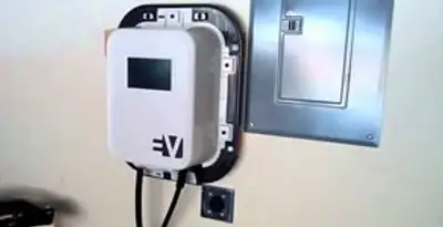 Electric car charger installation with wall-mounted EV charging station in Denver, CO