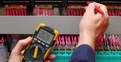 electrical service showing professional testing and troubleshooting of electrical panel by licensed electricians in Denver, CO