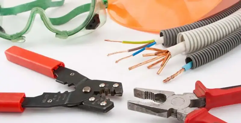 Electrical wiring repair with professional tools and safety equipment in Commerce City, CO