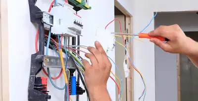 electrician services performing residential electrical panel wiring in Denver, CO