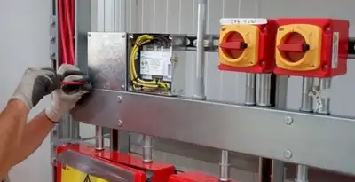 fire alarm installation service with certified electricians wiring fire alarm control equipment in Denver, CO