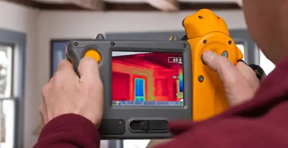 home energy audit service capturing thermal readings to analyze insulation and electrical efficiency in Denver, CO