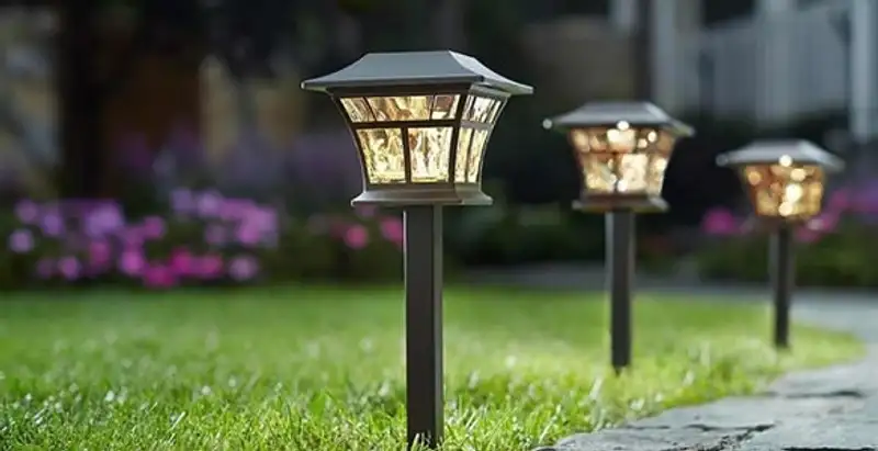 landscape lighting installation services with professionally installed pathway lights in Denver, CO