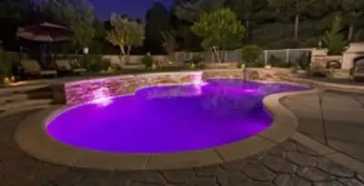 pool light installation and repair services illuminating a residential swimming pool in Denver, CO