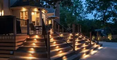 Residential electrician installing outdoor lighting for home safety in Denver, CO