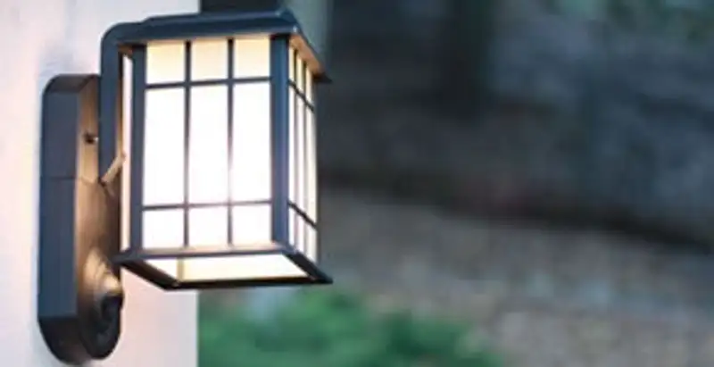 security light installation services with professionally mounted exterior wall light in Denver, CO
